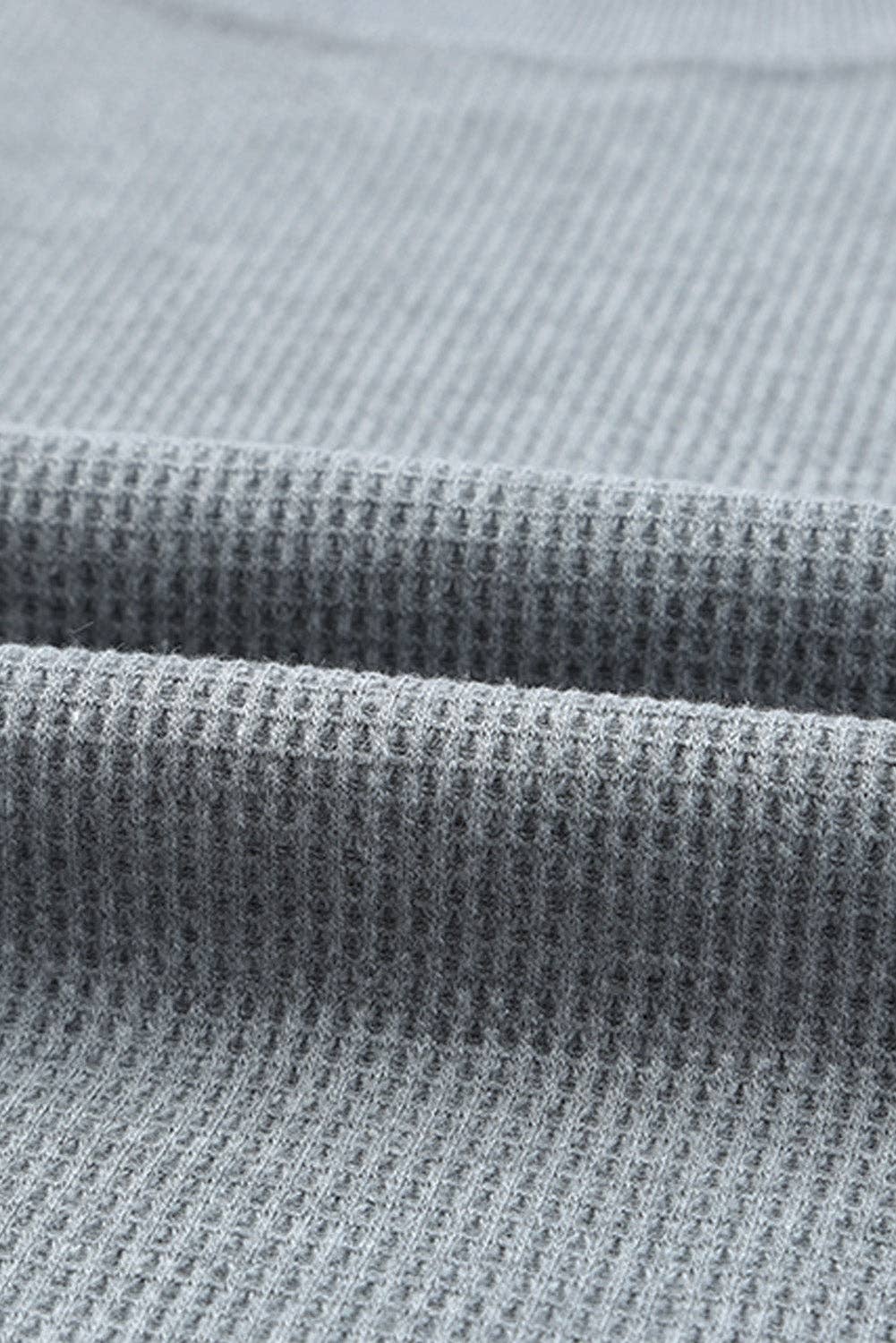 Meet your new favorite long sleeve top! It's all about that waffle knit texture with this Super classy unique texture and simple design – crew neck, long sleeves, and a straight hemline with some cool ribbed details. This waffle knit top is all about the cozy vibes, rocking a regular fit and made from seriously fine fabric. Upgrade your chill style with this laid-back essential that's as comfy as it is stylish! 