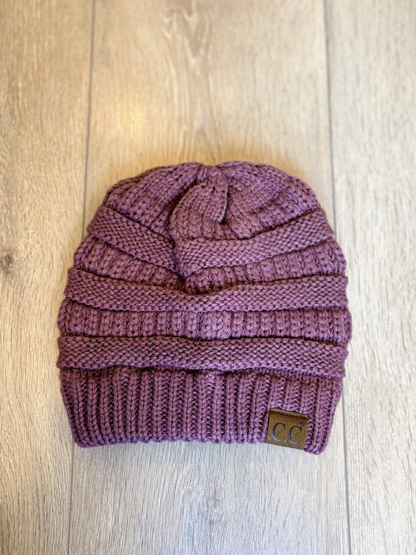 Mauve mix CC knit beanie with a ribbed texture, soft material, and cozy fit, perfect for cold weather